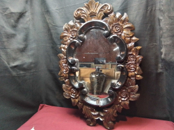 A Large Wooden Carved Wall Mirror.
W.50 H.75 Cm. (Damaged)