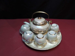 A Lovely Thai Tea Pot and 5 Cups & Plate.