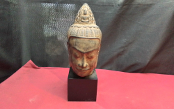 A Lovely Hand Carved Buddha Head on Base Stand Signed to Base of Head.