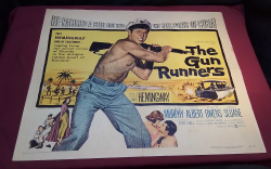 A 1958 vintage US half sheet poster 28 inches x 22 inches for the Ernest Hemingway film THE GUN RUNNERS
