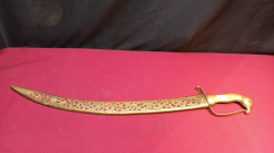A  Saber sword with pierced brass decorative shaft. 
L.62 Cm 