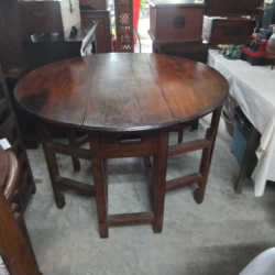 A Teak Old Gatleg Dropleaf Table. W.117  H.77 Cm.