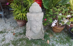 A Very Large And Heavy Stone Head 