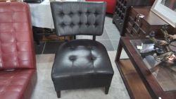 A Black Leather Chair.