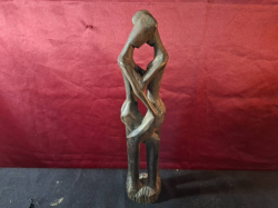 A Heavy Hardwood figure of male and female