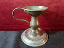 Old bronzed candle stick. H13 cm