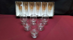 A Set of 6 Laurain HandCut Glasses  And 6 Brandy Glasses.