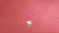 A Silver Pendant and Brooch with Chain.