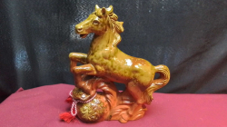 A Ceramic Horse Statue.
W.22 H.24 Cm.