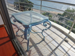 A Heavy glass Coffee table/ Outside table