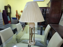 A metal and ceramic table lamp